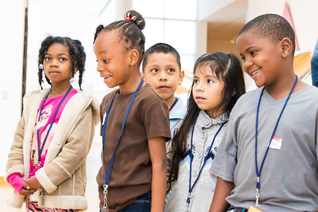 children field trip students Young children look surprised and delighted